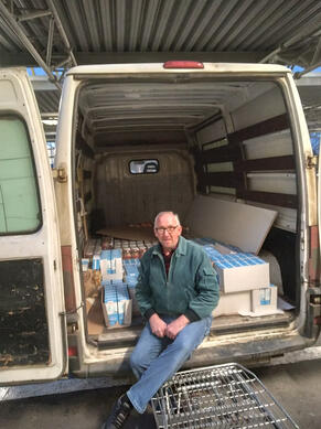 Chris with supplies for delivery
